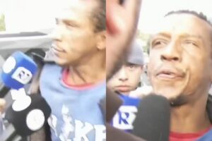 Suspeito de assassinato cospe na cara de repórter durante entrevista